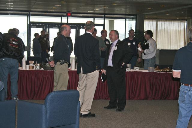 President Arnold talking to new SFM Ray Reynolds at the workshop.  Photo by Dawn Beisner.